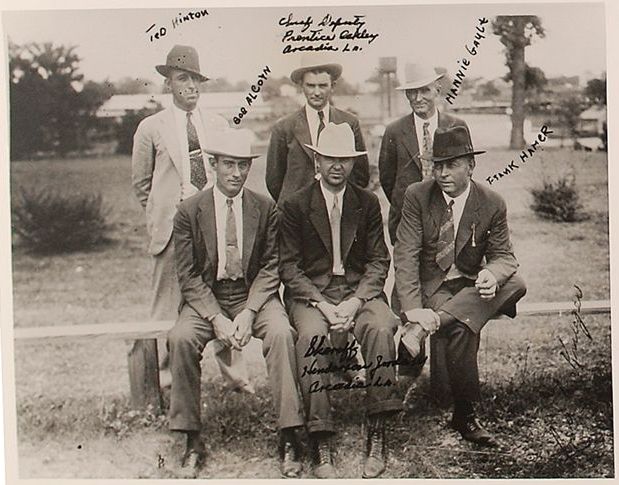 A group of men standing next to each other