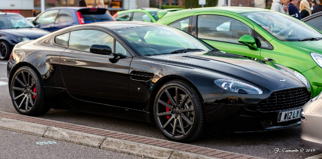 A car that is parked next to a parking meter - Pistonheads