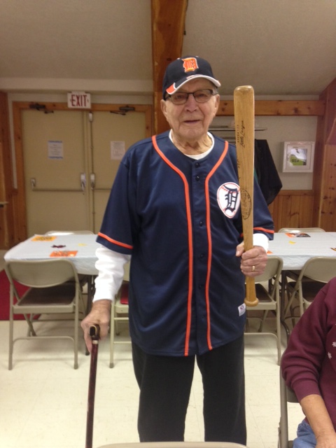 A man holding a baseball bat in his hands