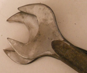 A close up of a person holding a pair of scissors - Pistonheads