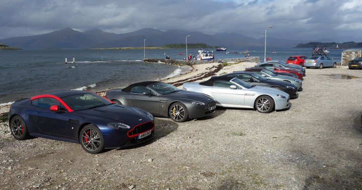 A group of cars parked on the beach - Pistonheads