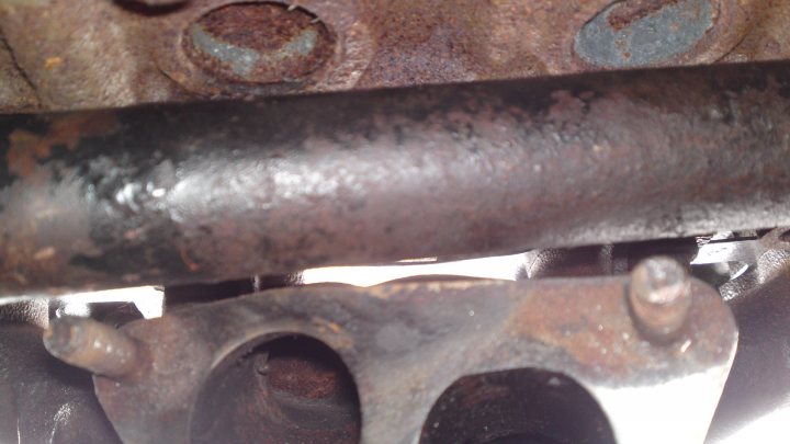 A close up of a rusted metal box - Pistonheads