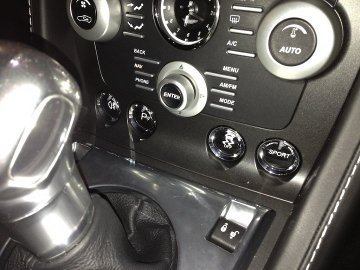 A close up of a car dashboard with a digital camera - Pistonheads
