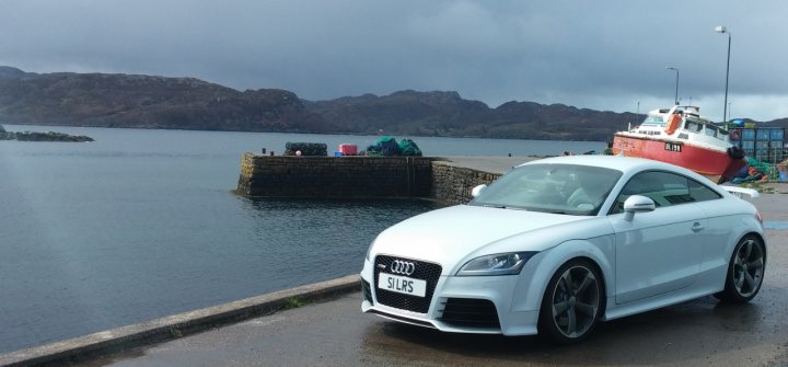 A small boat in a body of water - Pistonheads