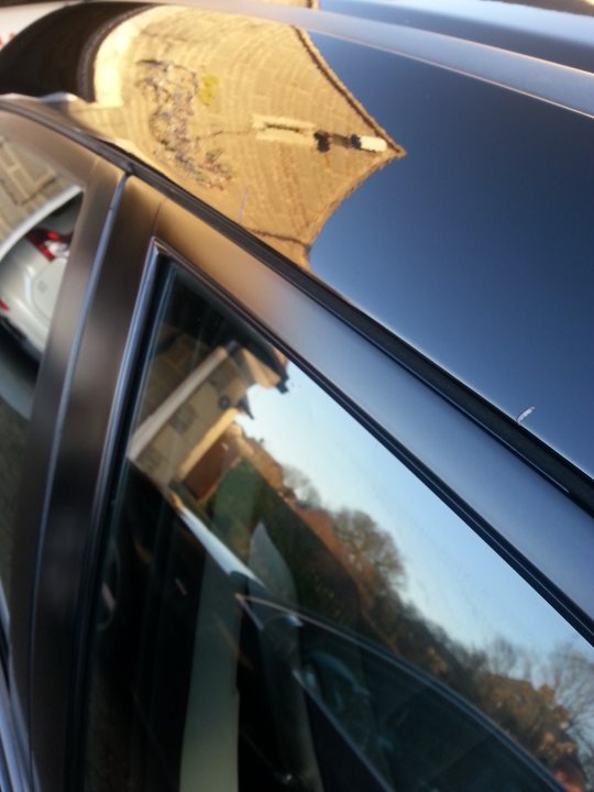 A rear view mirror on a car 's side view mirror - Pistonheads