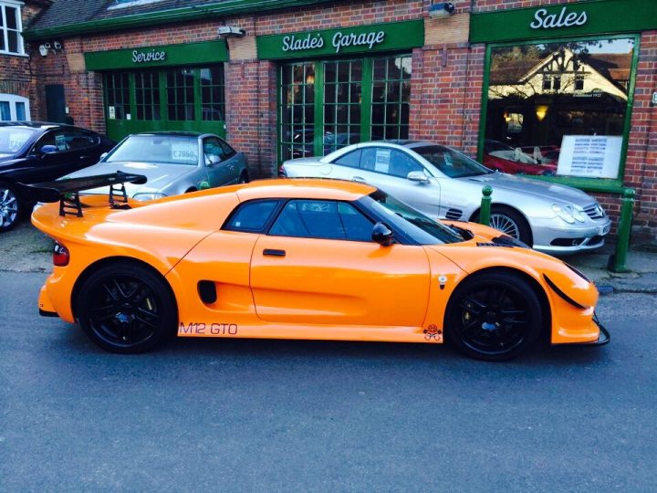 A car that is parked in front of a building - Pistonheads