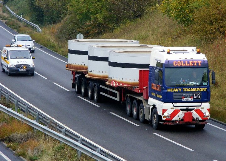 A semi truck is driving down the road - Pistonheads
