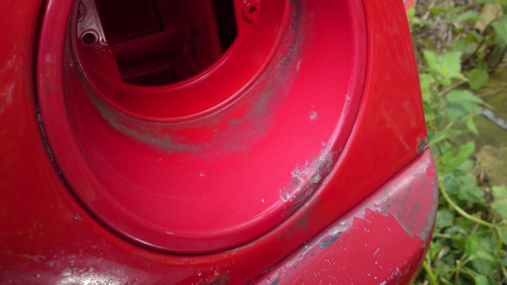 A red fire hydrant sitting on the side of a road - Pistonheads