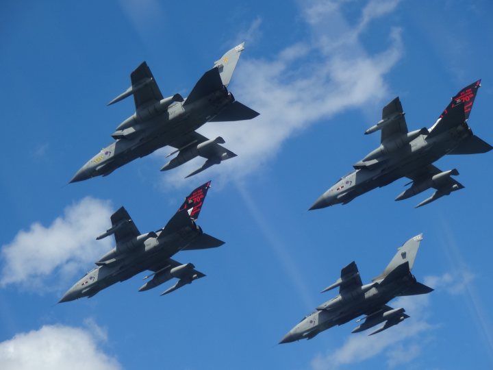A formation of fighter jets flying through a blue sky - Pistonheads