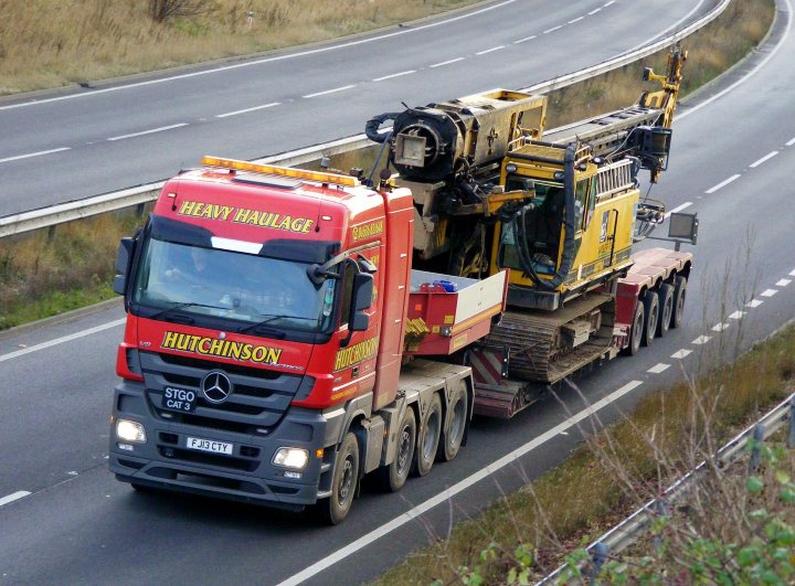 A dump truck is parked on the side of the road - Pistonheads