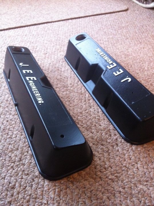 A couple of remote controls sitting next to each other - Pistonheads