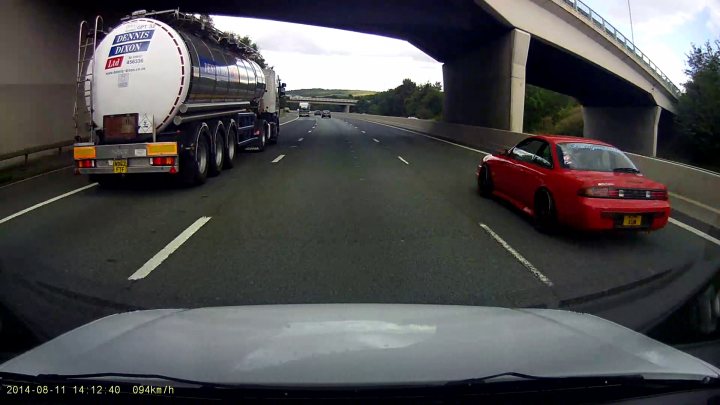 A semi truck is driving down the highway - Pistonheads