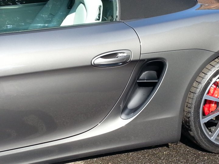 A close up of a car parked in a parking lot - Pistonheads