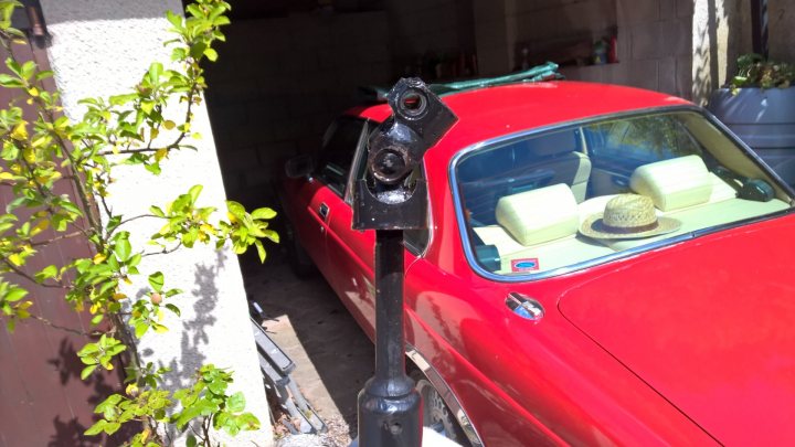A car is parked next to a parking meter - Pistonheads