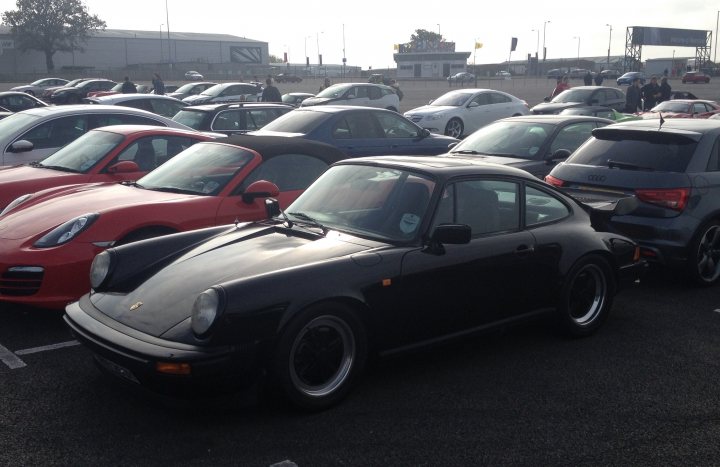 A bunch of cars are parked in a lot - Pistonheads