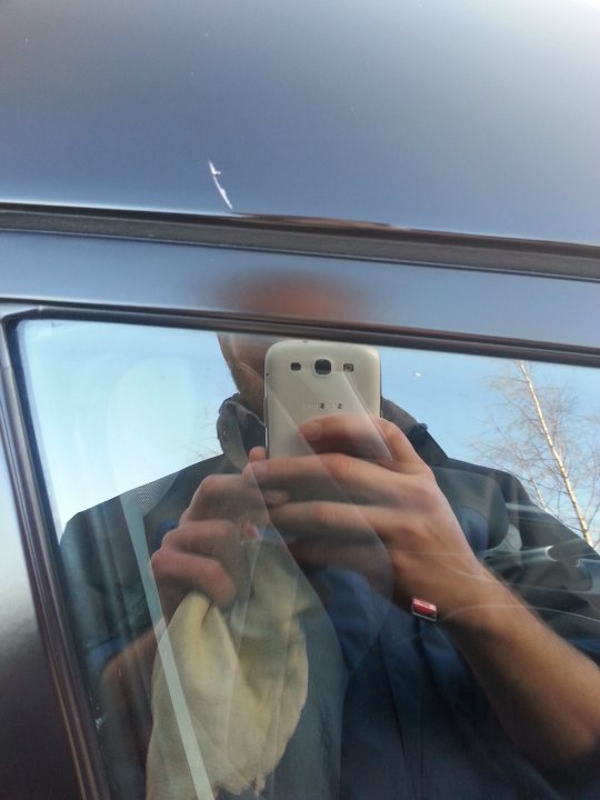 A man taking a picture of himself in a mirror - Pistonheads