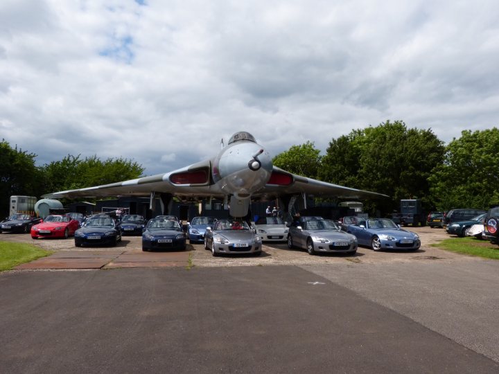 An airplane sitting on top of an airport tarmac - Pistonheads