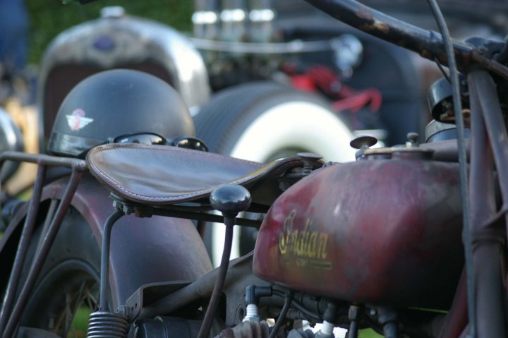 A close up of a motorcycle parked in a garage - Pistonheads