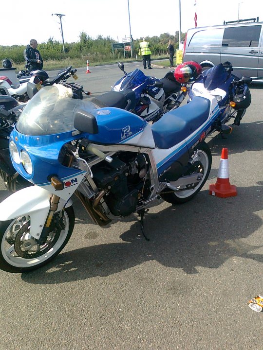 A row of motorcycles parked next to each other - Pistonheads