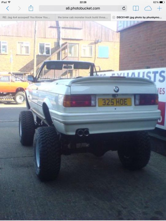 A white truck parked on the side of a road - Pistonheads