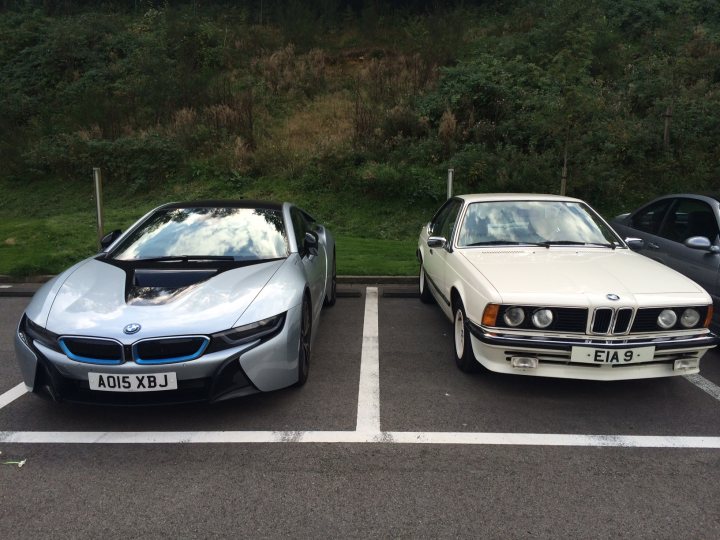 A couple of cars parked next to each other - Pistonheads