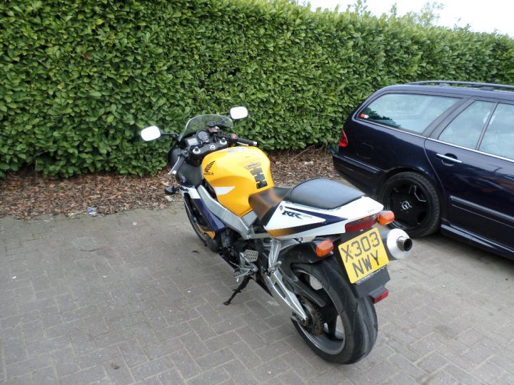 A motorcycle parked on the side of the road - Pistonheads