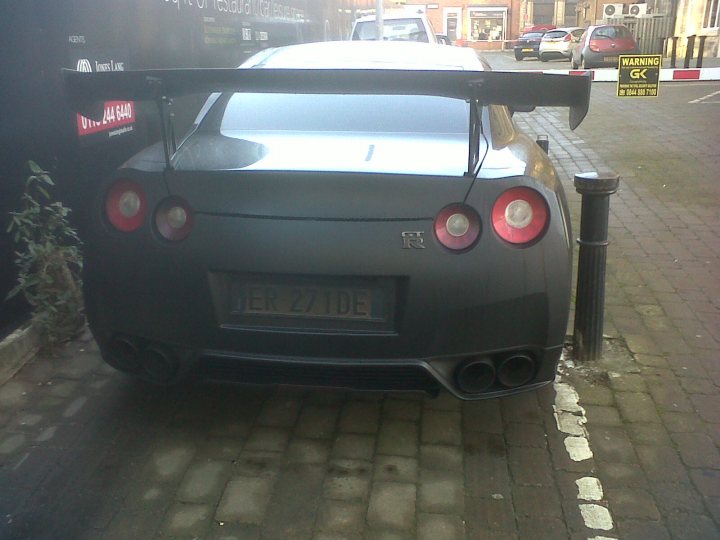 A car parked in front of a parking meter - Pistonheads