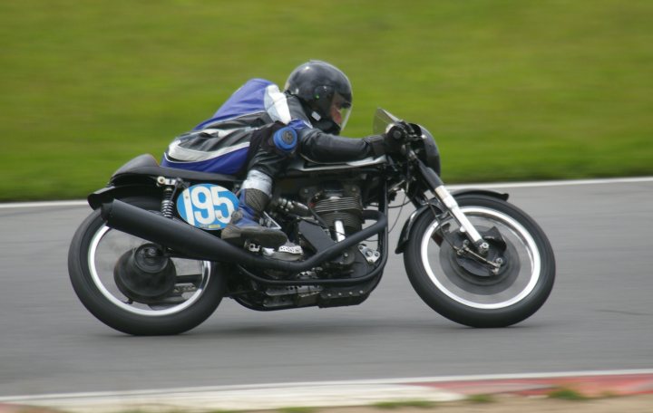 A man riding a motorcycle on a race track - Pistonheads