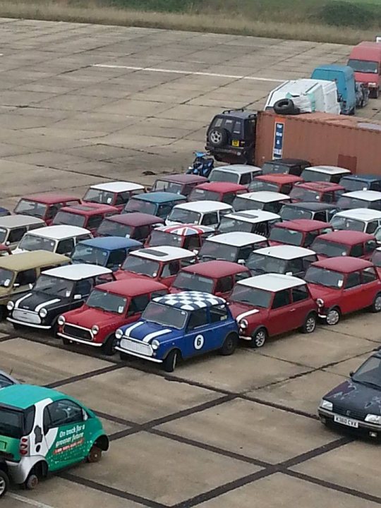 A bunch of cars that are parked in a lot - Pistonheads