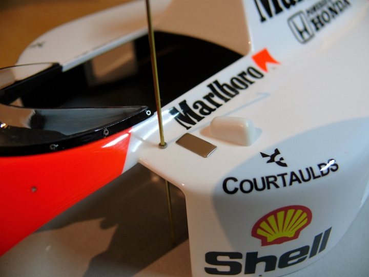 A close up of a cup of coffee on a table - Pistonheads