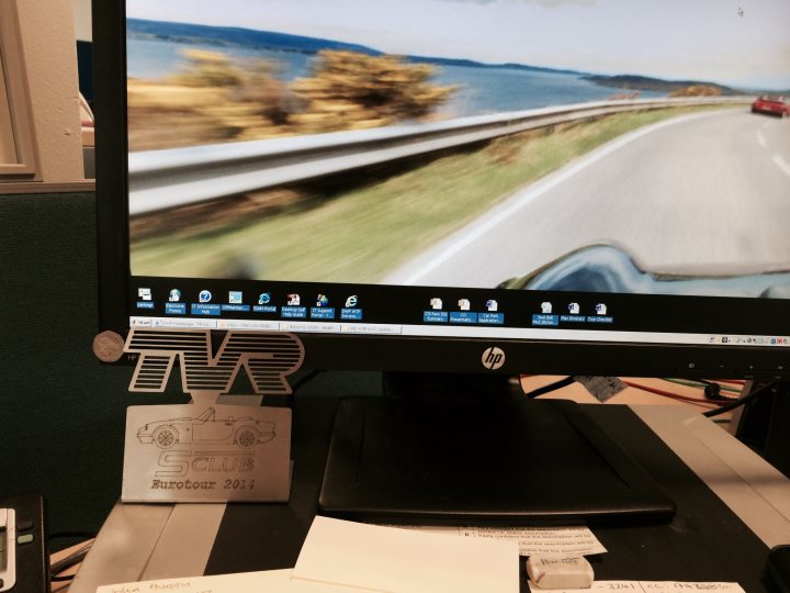 A computer monitor sitting on top of a desk - Pistonheads