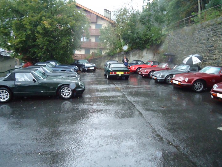 A group of cars that are sitting in the street - Pistonheads