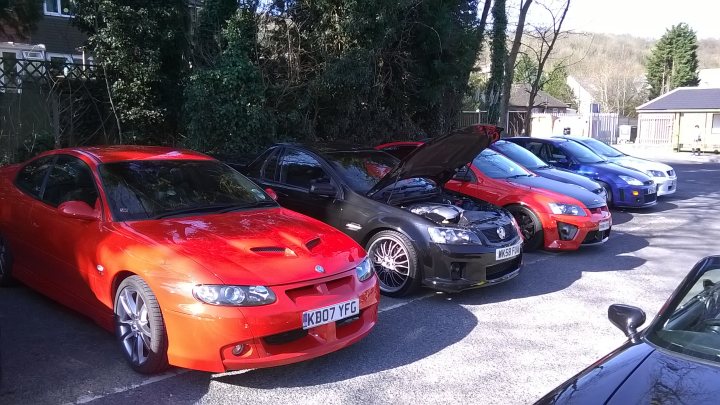 A bunch of cars are parked in a lot - Pistonheads
