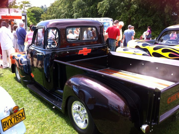 An old truck is parked in the grass - Pistonheads
