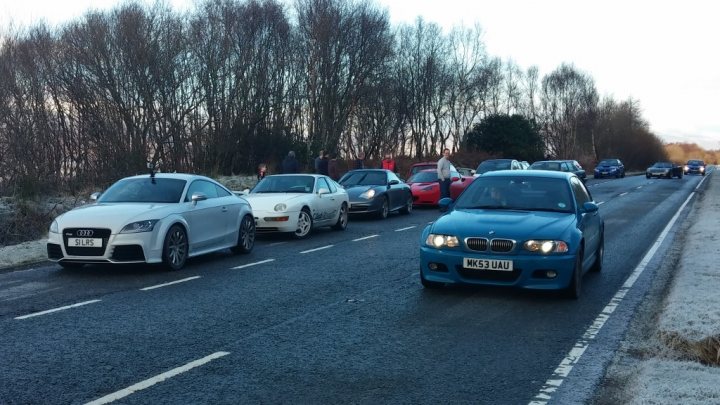 A group of cars are parked in a parking lot - Pistonheads