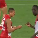 Australian Football League players celebrate win with secret handshake