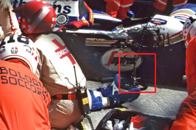 Slightly different footage of Senna's crash... - Page 10 - Formula 1 - PistonHeads - The image portrays a scene at a race, with a motorcross racer prominently displayed in the foreground. The racer is wearing an orange and white suit with the number 78 on it. There's also a medical cross visible on the suit, indicating the racer's team or the organization he's part of.

In the background, more of the race's setting is visible, including structures surrounding the race track. Other riders, wearing similar suits, can be seen preparing for their runs. The atmosphere suggests a bustling and competitive environment.