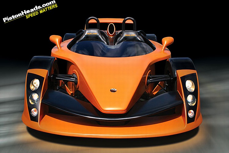 Pistonheads Hulme Kiwi Supercar Canam - The image is a photograph of a vehicle with a caveat emptor style graphic on the right side, which reads "PistonHeads Speed/Sports Forum." The vehicle appears to be a concept or racing car characterized by its orange and black color scheme, streamlined aerodynamic design, and front-facing lighting. It has a cockpit with black seats and numerous driving controls. The vehicle is pictured in motion against a dark background, emphasizing its sleek and powerful aesthetic. The artist or professional who created the graphic has likely aimed for an association with speed and performance, evoking the high-performance culture often found in automotive forums and communities.