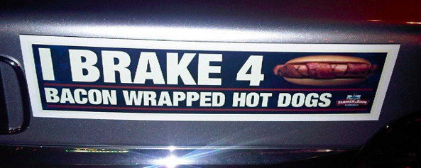 Pistonheads - The image features a bumper sticker with the text "I BRAKE 4 Bacon WrappedHot Dogs." Accompanying the text is a visual representation of a hot dog, suggesting that the driver or owner of the vehicle is a fan of bacon-wrapped hot dogs and is inclined to brake at the sight of them.