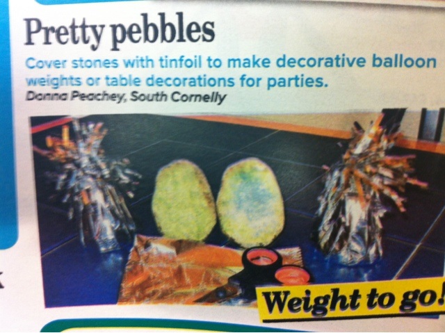 Life Hacks - Page 1 - The Lounge - PistonHeads - This is a magazine page featuring "Pretty pebbles," which are described as being heavier than tin foil to make decorative or table balloons for parties. Two photographs show silver and orange baubles on a blue-toned foil, and another image displays a green leaf decoration. The magazine also has a sale slogan saying "Weight to go!"