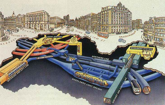 Is there a 3D model of the London Tube anywhere? - Page 1 - Boats, Planes & Trains - PistonHeads - This image is an intricate map depicting a city's infrastructure beneath the surface, showcasing an interconnected network of pipes and subway tunnels. The underground world is populated with buildings that represent various government and transportation services. The map is fascinating, revealing the hidden world beneath the city's streets. It highlights the Docklands Light Railway (DLR), which appears as a prominent transportation link across the map. The level of detail and depth-perspective in the image provide a comprehensive view of the city's underground life.