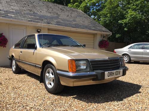 Classic (old, retro) cars for sale £0-5k - Page 209 - General Gassing - PistonHeads - This image depicts a beige or light brown car parked on a gravel driveway next to a beige or light brown garage. The car has a distinctive front grille and the license plate reads "ORH 101V." Behind the car and garage, there are green trees, and the sky is mostly cloudy with a few patches of blue visible in the corners of the image.