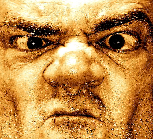 Royal Wedding Noes Pistonheads - The image presents a close-up view of a person's furrowed brow with deeply set wrinkles and crow's feet, beside their intense, dark eyes that are looking directly at the camera. The skin texture appears to be slightly discolored with certain areas having a darker tone, giving it a somewhat artistic and textured look. The features suggest a man who might be in his middle to older years.