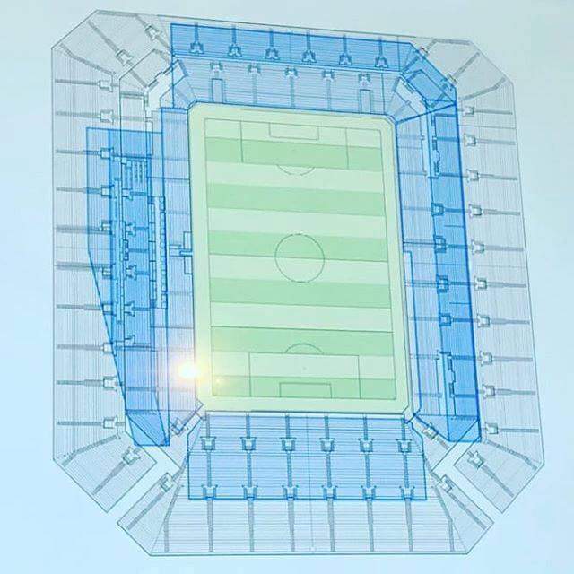 The Official Everton thread... - Page 436 - Football - PistonHeads - This is a schematic or architectural diagram of a soccer stadium. The image presents the interior of the stadium in plan form, showing the layout of seats, pitch markings, and possibly other facilities. The seating area is represented with a blue outline, suggesting it's a visualization or a plan unassembled. The center of the diagram is the 'centre circle,' typically used for penalty kicks in soccer. The edges are where the boundaries may be located according to normal field dimensions. No bulging curtains or players are visualized, so it's a design or simulation of the space rather than an actual playing field.