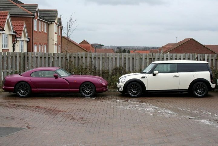 A car parked in a parking lot next to a car - Pistonheads