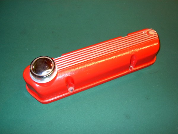 A red and white fire hydrant sitting on a sidewalk - Pistonheads - The image shows a red tool with a grey non-slip knob on its top left corner, designed for holding small objects. It features ridged sides and has a flat base for stability. This object is likely a vice grip or a clamp due to its shape and colors. The background is a dark green, which contrasts with the vibrant red of the tool. The tool appears to be in good condition, suggesting it might be well-taken care of or rarely used.