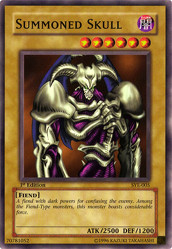 The image is a colored collectible card presenting a card from a "Yu-Gi-Oh! Trading Card Game" (TCG). The card's central artwork depicts a powerful-looking dark fantasy figure covered in intricate details and armor; the figure is armed with a sword and a shield. The card is set within a yellow border providing a detailed aura effect around the figure. At the top of the card, the text "Summoned Skull" is visible, indicating the name of the card. The bottom of the card has additional details including its attack and defense values, along with text that name's the card's currently equipped spells or effects.