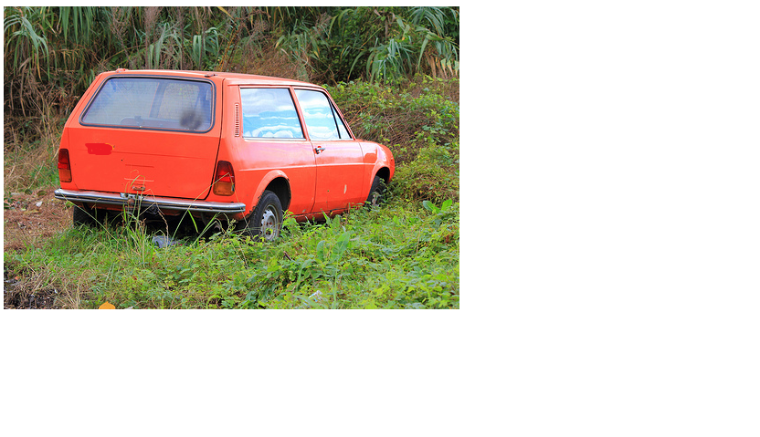 A red pick up truck parked in a field - Pistonheads