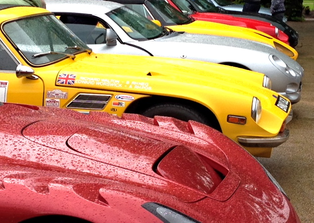 A red and yellow fire hydrant sitting on the side of a road - Pistonheads