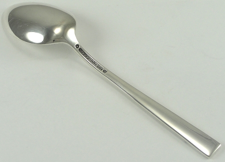 New Teaspoon Advice Please - Page 5 - The Lounge - PistonHeads - The image shows a single, silver-colored spoon placed against a plain, light background. The spoon has a shiny surface that reflects some of the light, giving it a polished look. There are no texts or other distinctive markings visible on the spoon. The spoon's handle is elongated, and it stands straight up, reflecting some of the surroundings.